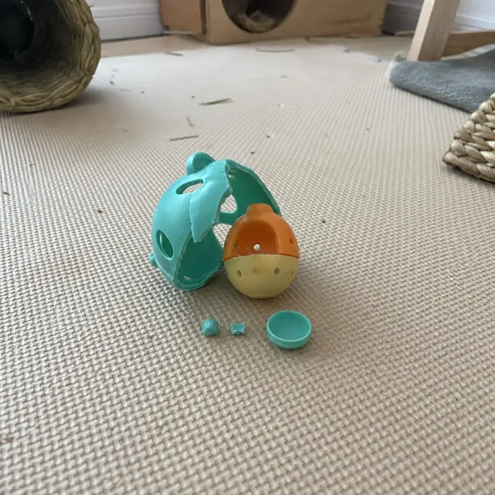 Broken brittle plastic rabbit toy with small loose pieces